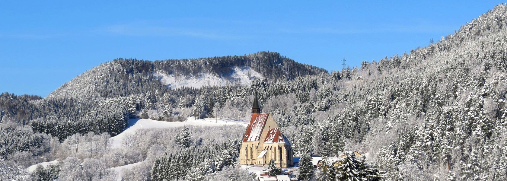 Die Wolfgangskirche im Winter, © Marktgemeinde Kirchberg am Wechsel/Wolfgang Riegler